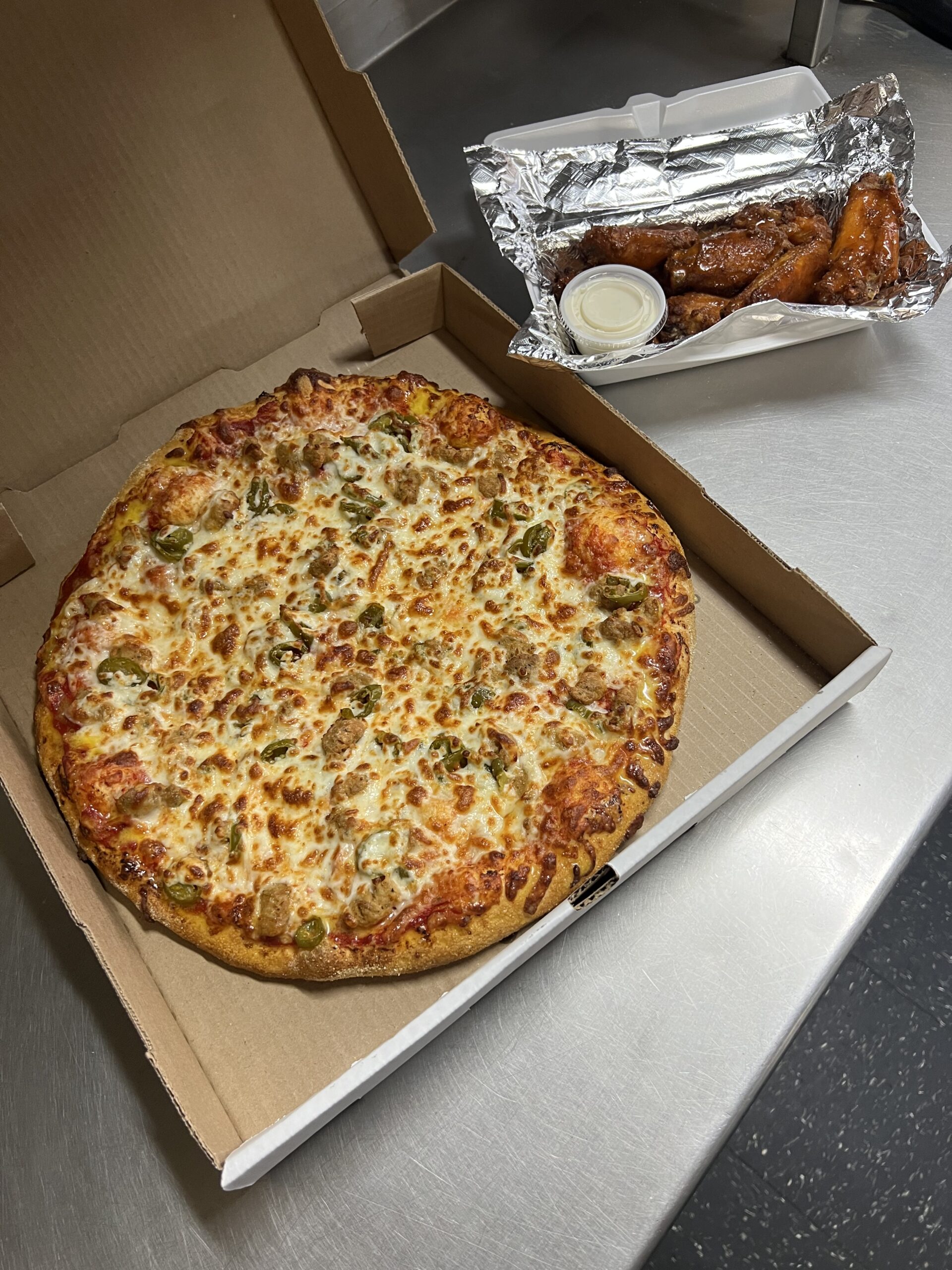 1 LARGE 2 TOPPING PIZZA & 6 PIECE OF WINGS