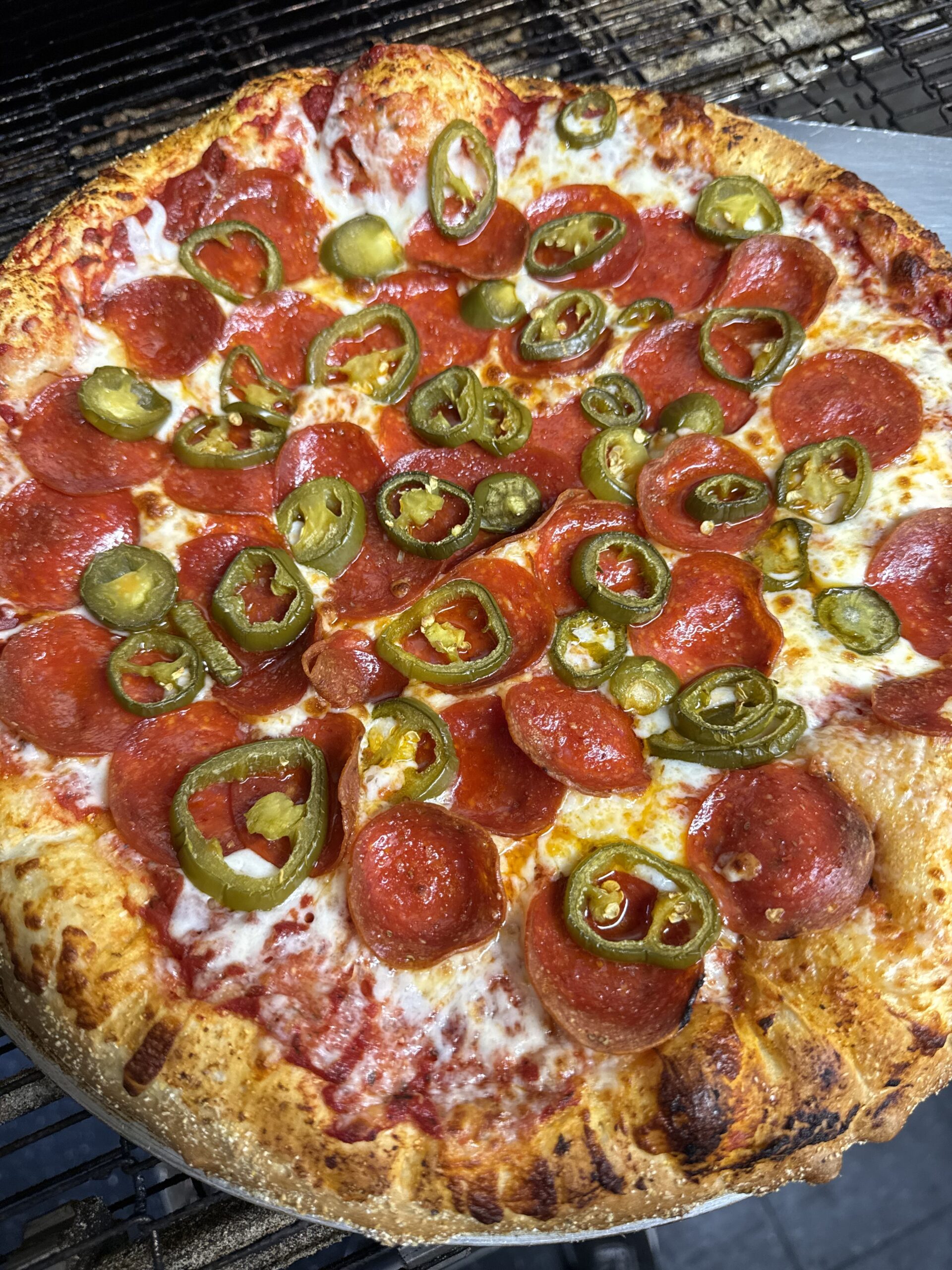 Pepperoni and jalapeño pizza